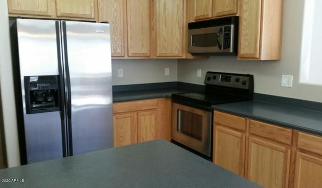 Building Photo - 12925 W Fleetwood Ln
