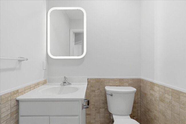 Building Photo - Welcome home to this beautifully updated and move-in-ready 3-bedroom, 3.5-bath townhouse