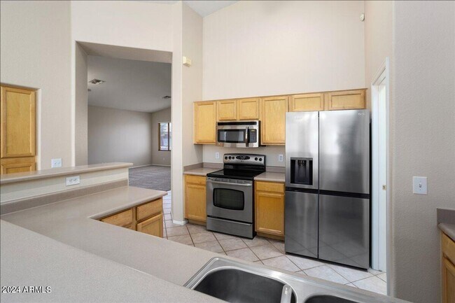 Building Photo - Spacious Corner Lot Home with 3-Car Garage in Surprise