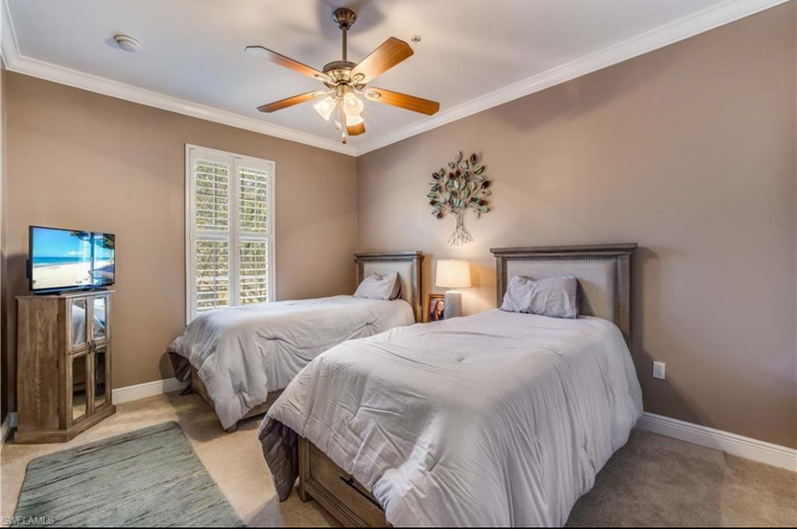 3rd bedroom with twin beds and storage - 16570 Goldenrod Ln