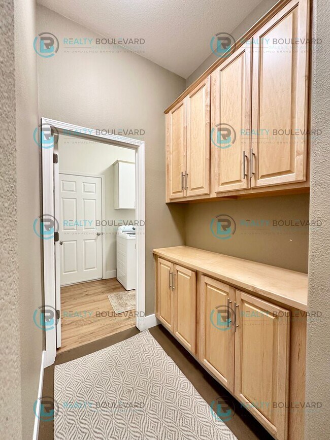 Building Photo - Open Kitchen, Expansive Living, and Covered Patio in Tranquil South Reno Near Trails, Parks & Sho...