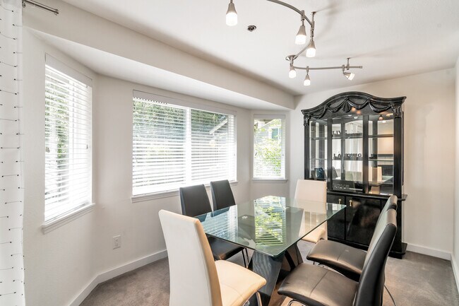 Dining with large windows. - 19404 Bothell Way NE