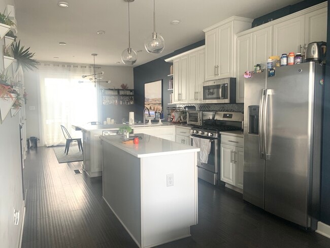 Kitchen into dining area - 3606 Journal St