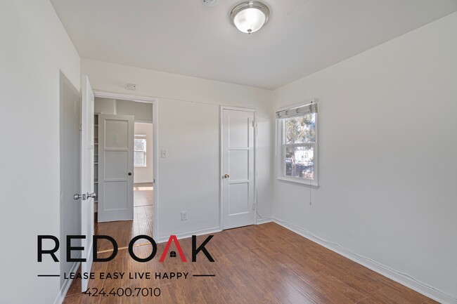 Building Photo - ~$300 OFF Each Month~ Sun-Drenched Two Bed...