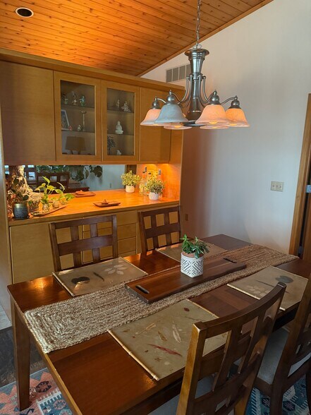 The dining side of the living-dining area - 4888 Tee Ct SW