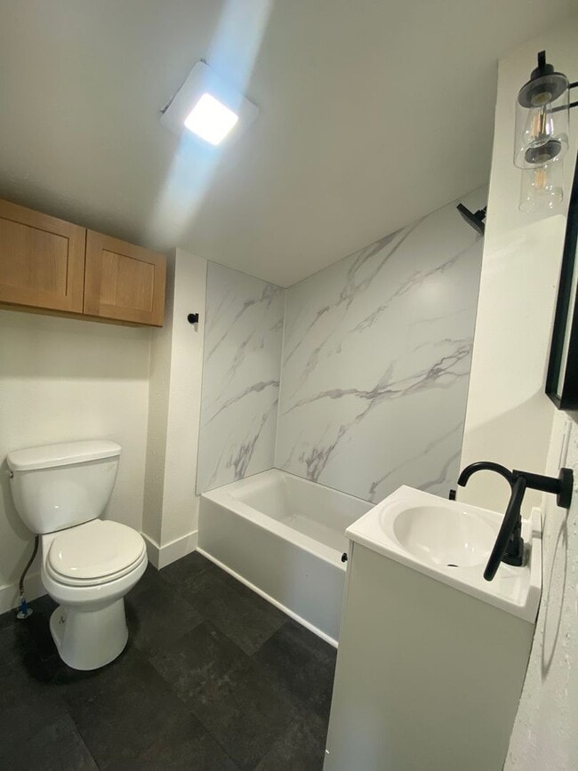 Building Photo - Totally remodeled 3-bedroom, 2-bath available now near Spokane Community College with large shop