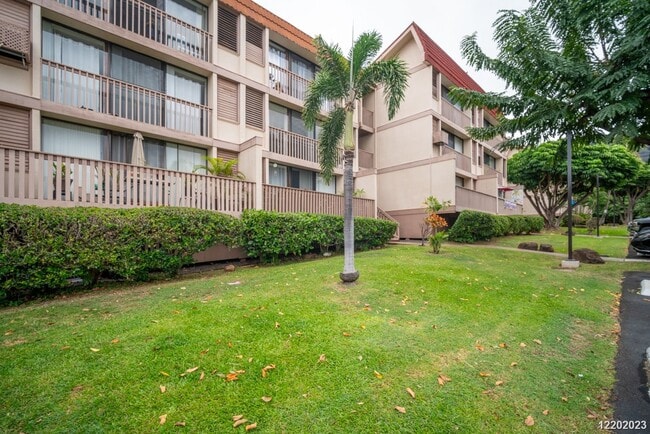 Building Photo - This 2 bedroom, 1 bathroom unit is on the 2nd story in the Makaha Valley Plantation condos. It is...