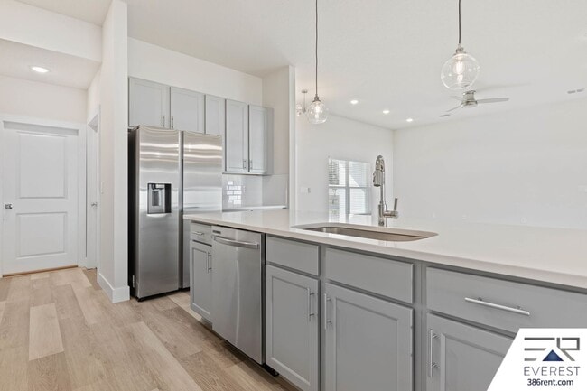 Building Photo - FULLY FENCED, UPGRADED 3/2/2 IN DESIRABLE PINE GROVE