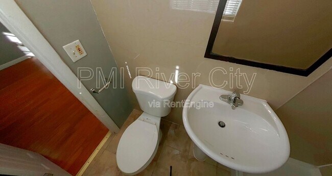 Building Photo - 7471 John F Kennedy Dr W