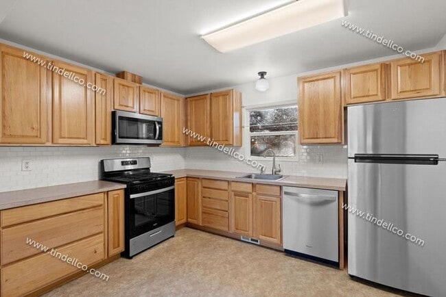 Building Photo - Cozy 2BR Corner Lot Home with Garage, Shed & Fenced Yard!