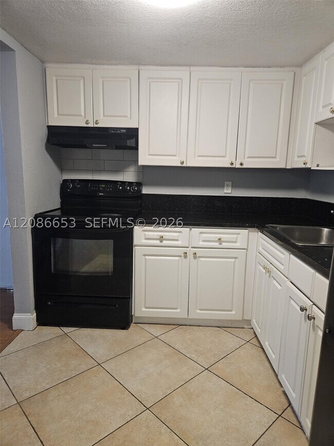 Building Photo - 8301 SW 142nd Ave