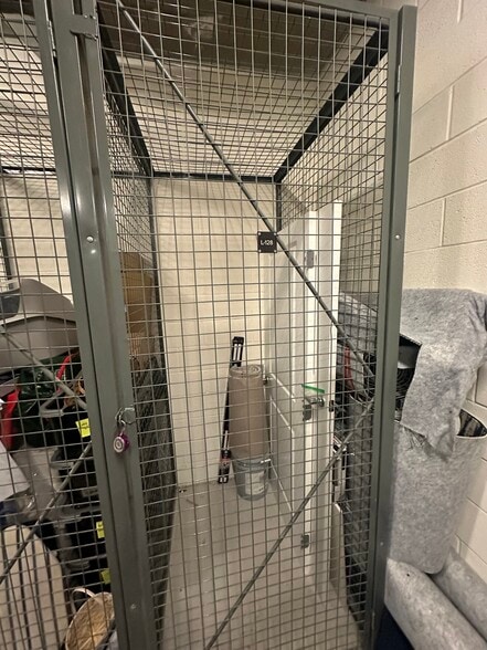 Storage unit (on first floor). Has spare carpet and lights for tenants. - 440 L St NW