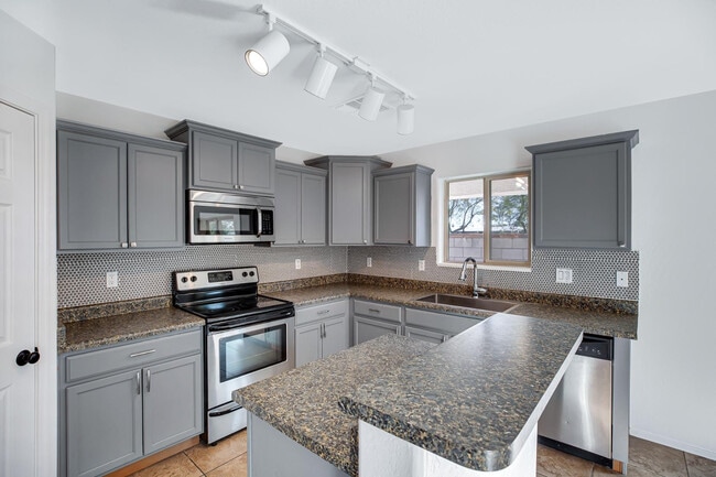 Building Photo - 9547 E Belmont Ave