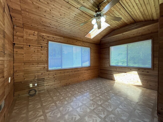 Building Photo - Charming Ranch Home with Sunroom or 4th Bedroom, Two-Car Garage and Fenced Backyard