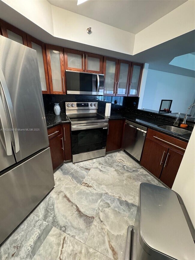 Building Photo - 6767 Collins Ave