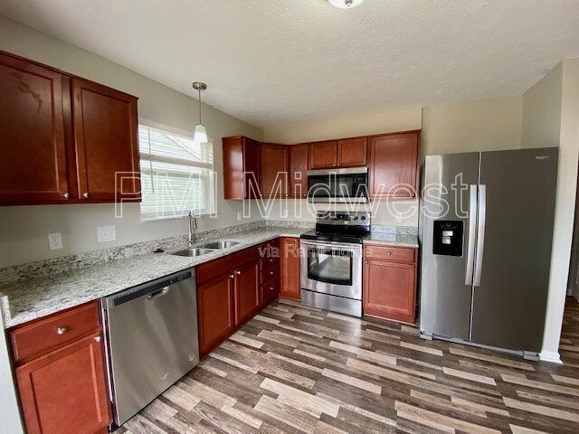 Building Photo - 8014 Harshaw Dr