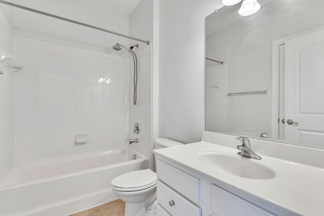 Building Photo - Spacious End Unit with Garage in Gated Com...
