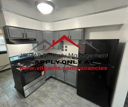 Building Photo - This keen & clean 2 bed / 1 bath ranch-sty...