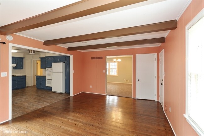 Kitchen leads to family room - 11009 Elmwood Ave