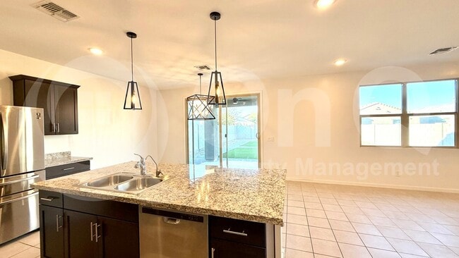 Building Photo - 40414 W Sunland Dr