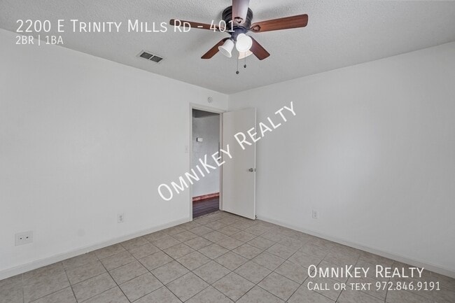 Building Photo - 2200 E Trinity Mls Rd
