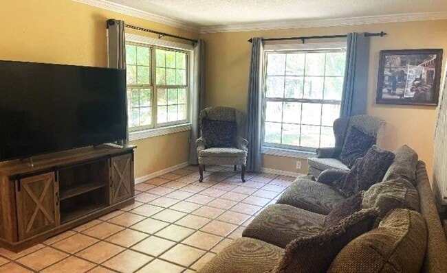 Building Photo - Welcome to this private retreat offering the perfect blend of luxury space and outdoor living.