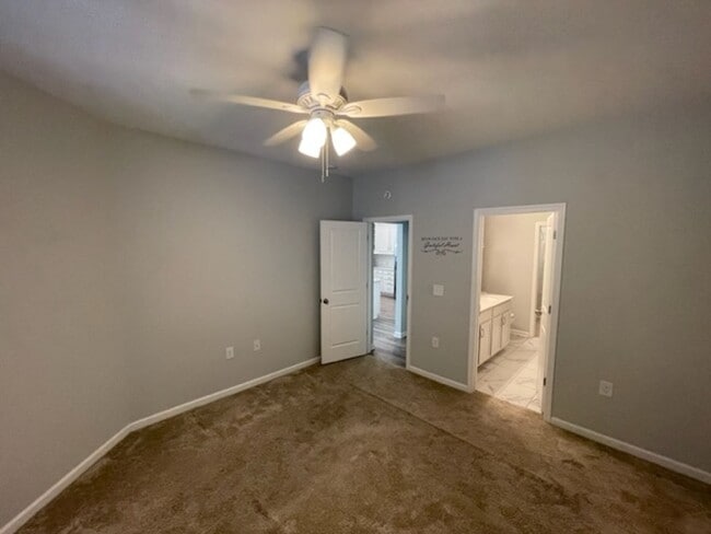 Building Photo - MOVE IN READY! Amazing end-unit townhome