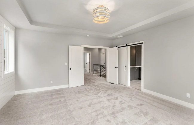 Building Photo - Stunning Bethany Farmhouse with Chef’s Kitchen, Media Room, Main-Level Suite & Luxury Designer Fi...