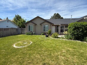 Building Photo - Updated 4-Bedroom Corner Lot Home with New Flooring, Carpet & Fresh Interior Paint