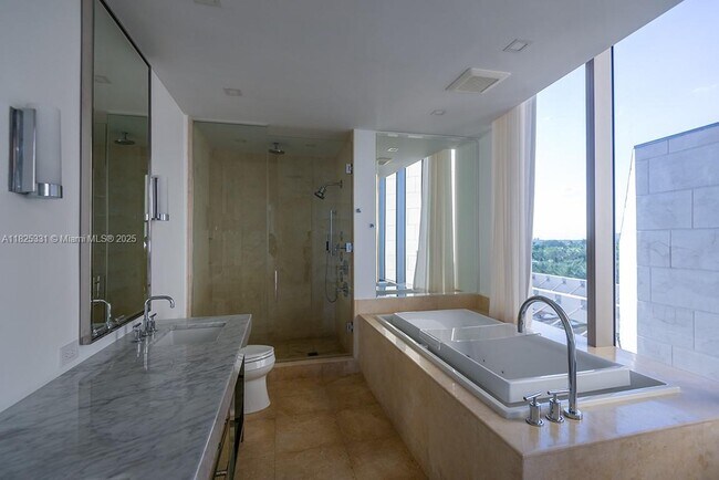 Building Photo - 9701 Collins Ave