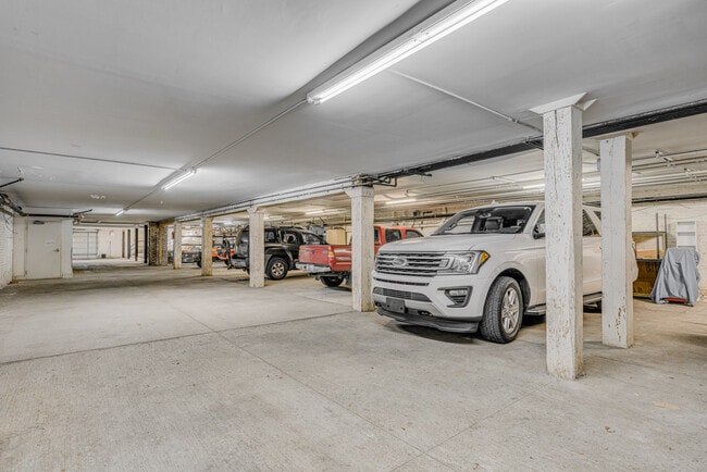 Assigned parking space in secured attached garage w/ room for bikes, etc. - 310 S Main St