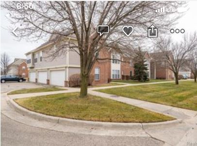 Showing exterior of the building and two car garage (middle garage) - 51870 Adler Park Dr E