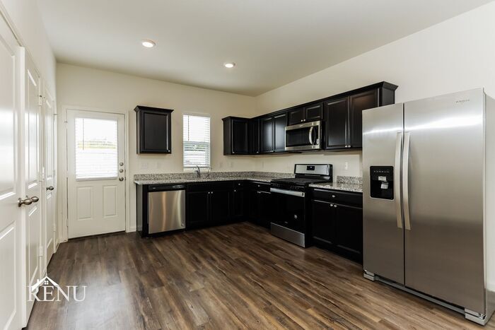 Building Photo - 5010 Firefly Hls