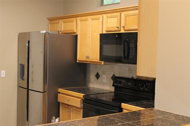 Building Photo - 11558 Spicewood Pkwy