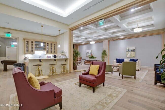 Building Photo - Welcome to your dream condo in the heart o...