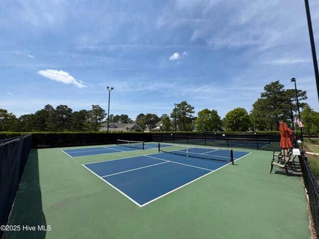 Building Photo - Welcome to this stunning 4-bedroom, 3.5-ba...