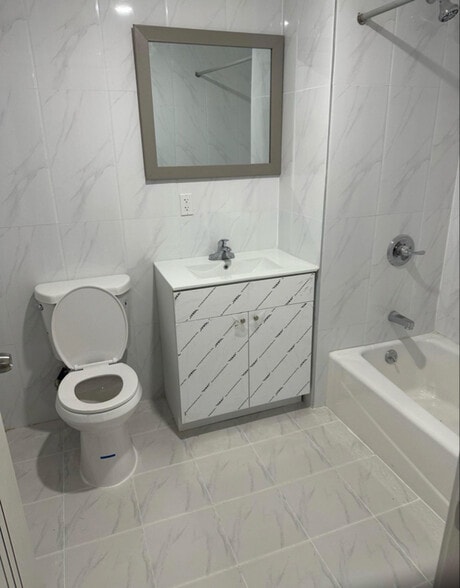 Building Photo - 70-45 45th Ave