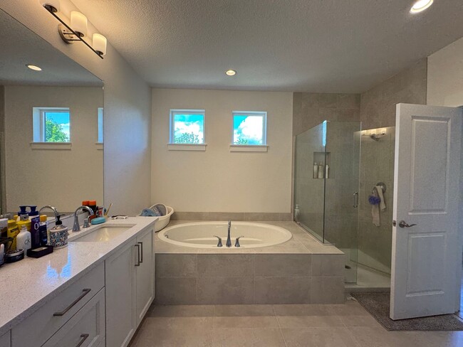 Building Photo - Modern and Immaculate 4-Bedroom Bethany Home with Designer Finishes and Fenced Yard