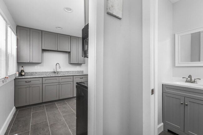half bath off of kitchen - 1622 -1624 Orange St.