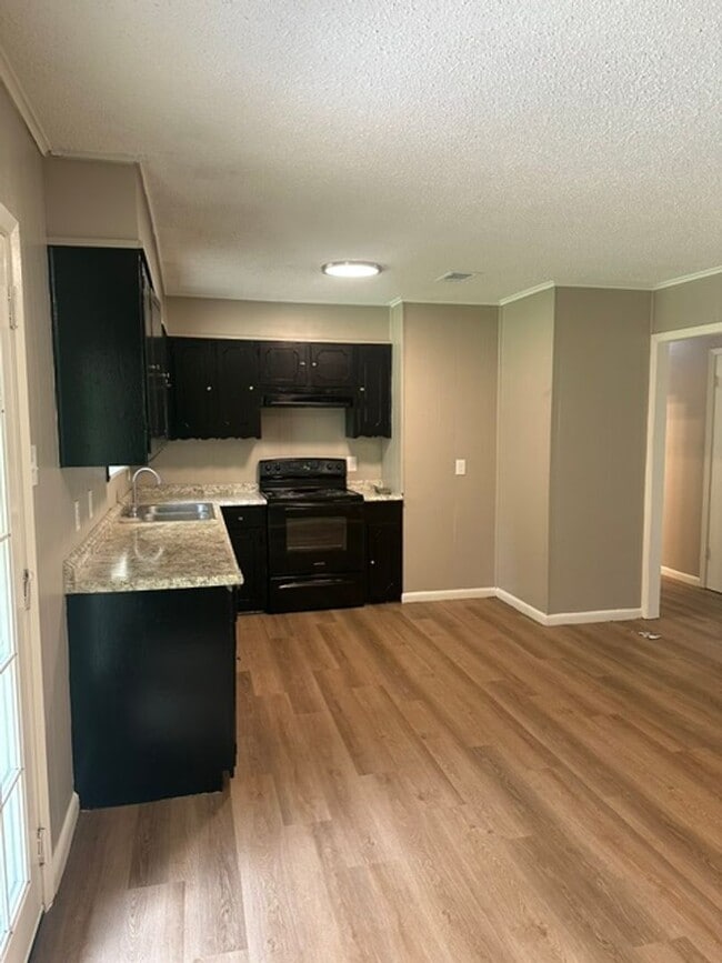 Building Photo - 4/1.5 PTISD Fenced yard and pet friendly