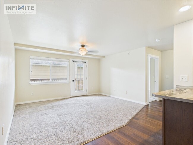 Building Photo - Cute As A Button 2 Bedroom Condo on Baxter Lane!