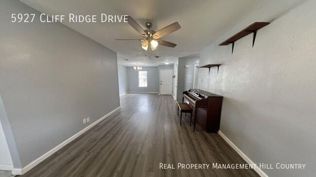 Building Photo - Three bedroom home with covered patio