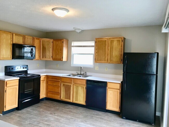 Building Photo - COMING SOON!! 4 Bedroom 2.5 Bathroom Two Story Brick Front Home in Pike Township!