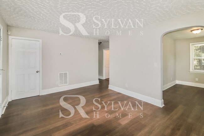 Building Photo - Proper Design. Smartly Priced. Ready for Move-In!