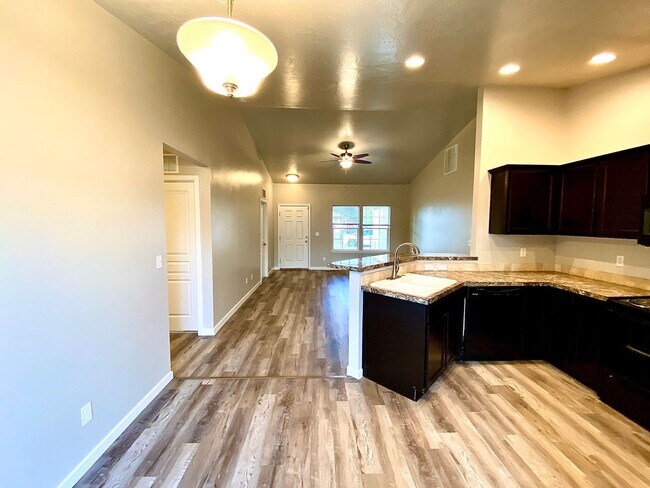 Building Photo - 4 Bedroom + Bonus with 2 baths available 8/22