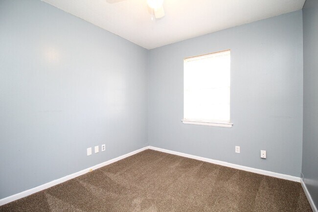 Building Photo - Spacious 3BR/1.5BA Home in Pace with Open Living Area, Tiled Family Room, and Fenced Backyard – M...