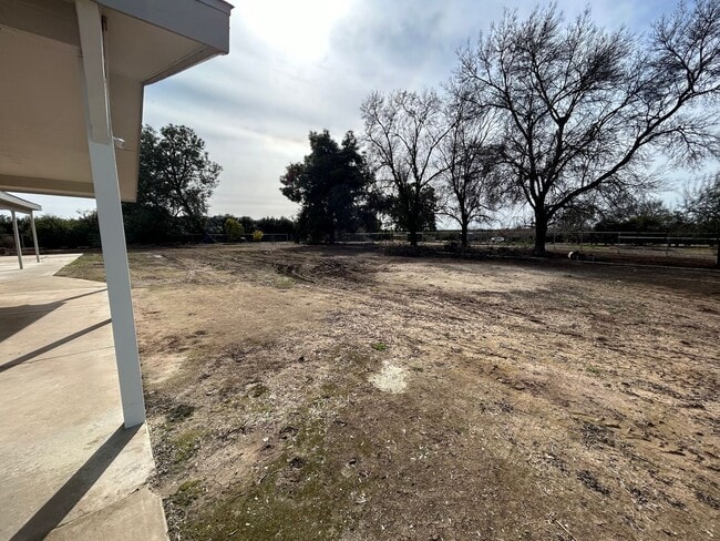 Building Photo - Rare opportunity to experience Country liv...