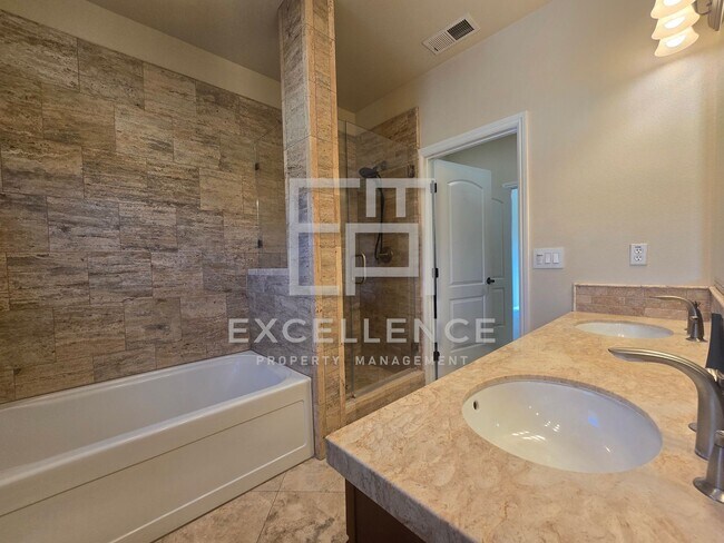 Building Photo - 3/3.5 Townhouse with 2 Car Garage, 2 Maste...