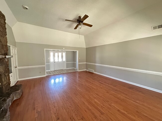 Building Photo - Grand 4BR/2BA Near Southwind | 2,438 Sq Ft, Stone Fireplace, Soaking Tub & 2-Car Garage