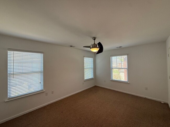 Building Photo - Spacious End-Unit Condo with Dual Primary Suites & Bonus Room